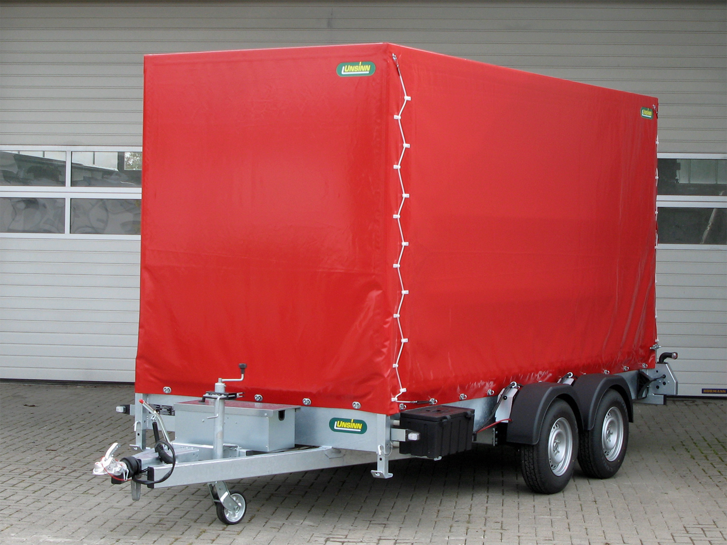 un11193-e-hp_unsinn_uag_4217-35-14-e-hp_1.jpg Unsinn UAG 4217-35-14-E-HP Absenkanhänger mit Elektrohydraulik und Planenaufbau - Bild 1